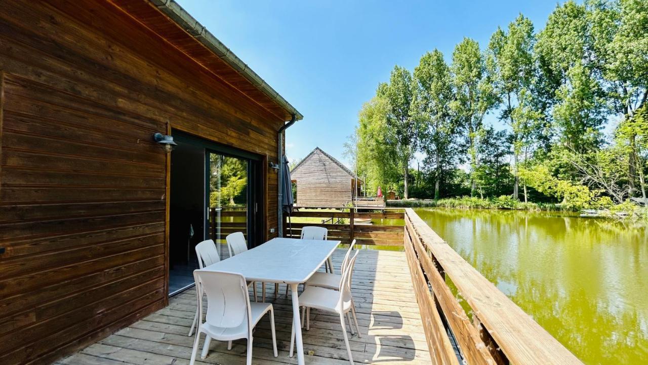 Chalet avec terrasse sur pilotis vue sur l'étang Rue  Esterno foto