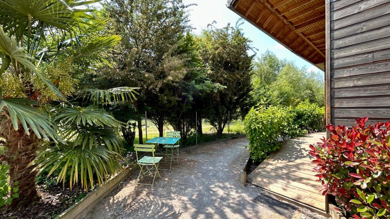 Chalet avec terrasse sur pilotis vue sur l'étang Rue  Esterno foto