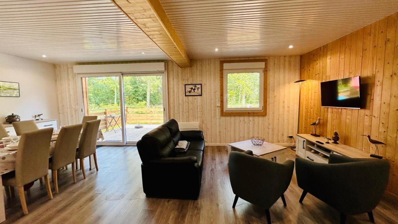 Chalet avec terrasse sur pilotis vue sur l'étang Rue  Esterno foto