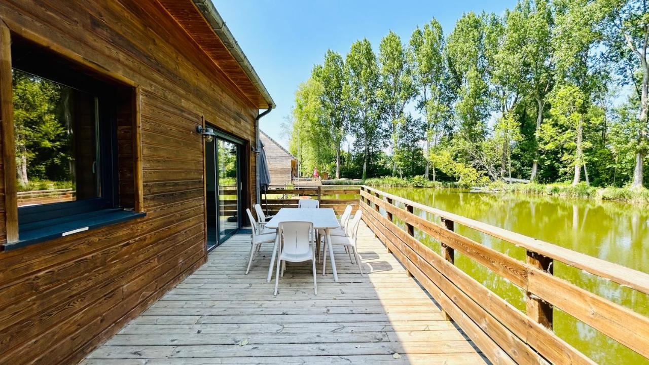 Chalet avec terrasse sur pilotis vue sur l'étang Rue  Esterno foto