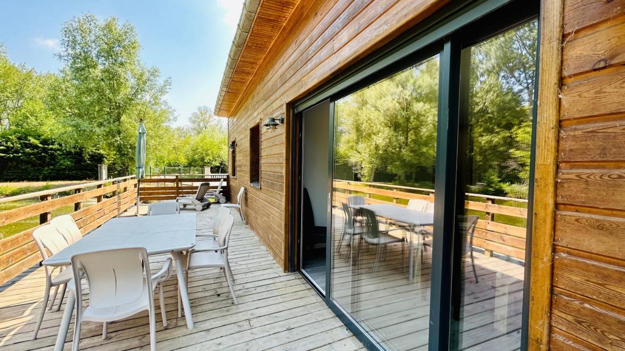 Chalet avec terrasse sur pilotis vue sur l'étang Rue  Esterno foto