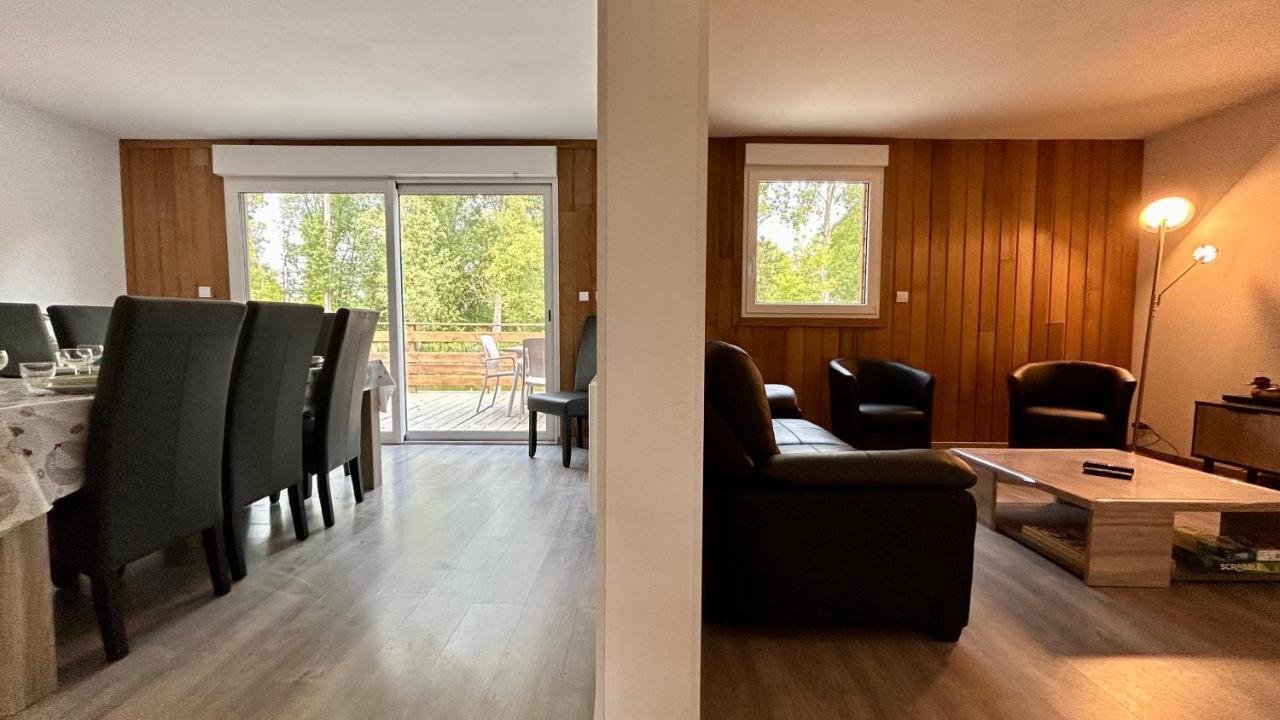 Chalet avec terrasse sur pilotis vue sur l'étang Rue  Esterno foto