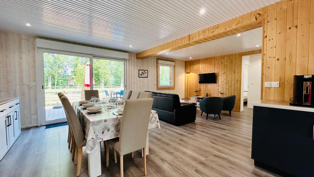 Chalet avec terrasse sur pilotis vue sur l'étang Rue  Esterno foto